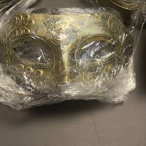 Lot of 29 NEW plastic Gold Decorative Madi gras Masks.
